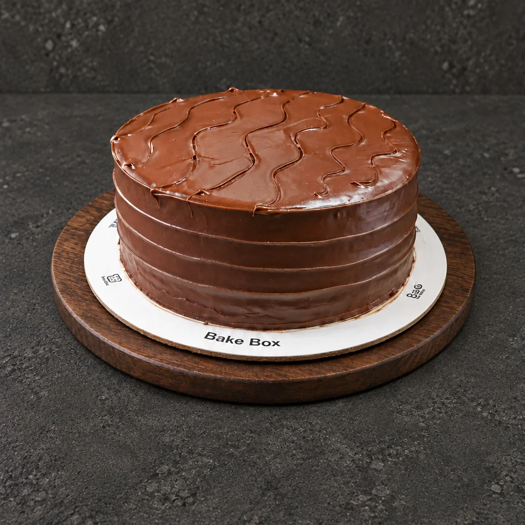 Round Nutella Cake with banded sides and a wavy top